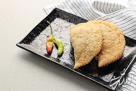 طرز تهیه خمیر پیراشکی,مواد لازم برای تهیه پیراشکی گوشت,دستور پخت مواد میانی پیراشکی